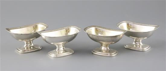 A set of four George III Irish silver pedestal salts by James Scott, 11.5 oz.
